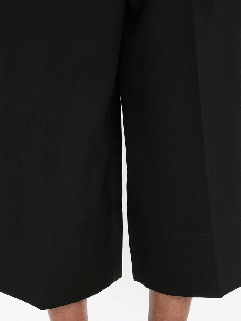 JW Anderson Clothing Black ‘Pleat Front Wide Leg Cropped Trousers' 7 JW Anderson Clothing Black ‘Pleat Front Wide Leg Cropped Trousers'
