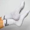 Soxygen Unisex White ‘Shit Happens’ Classic Socks Accessories